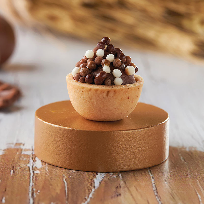 Chocolate y perlas dulces